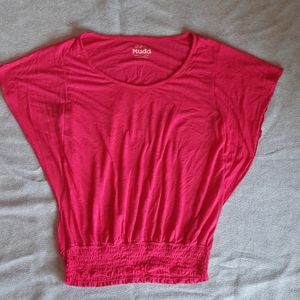 Smocked waist, flowy sleeved, short sleeved top.